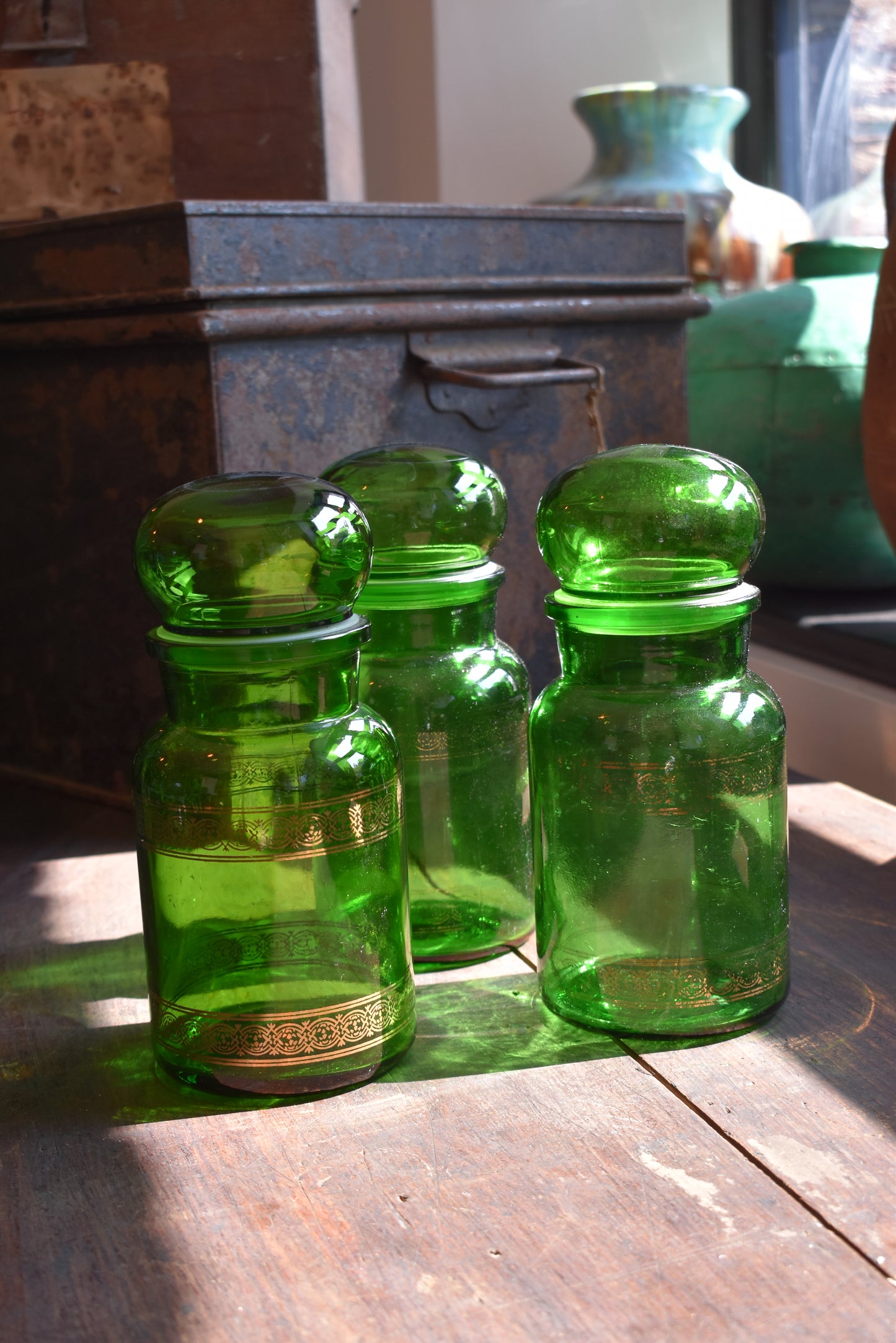 Pair of Green Pharmacy Bottles