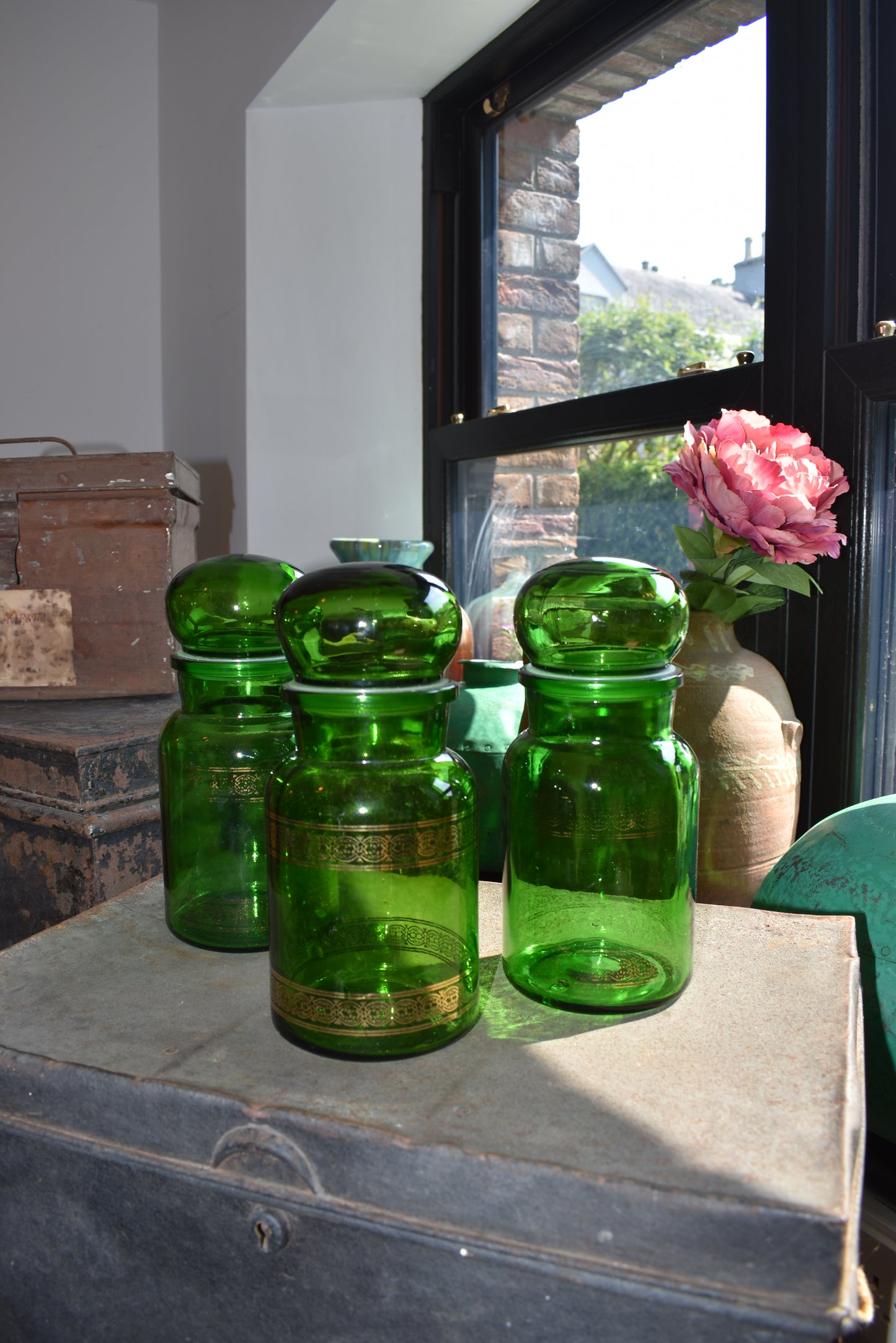 Three Green Pharmacy Bottles