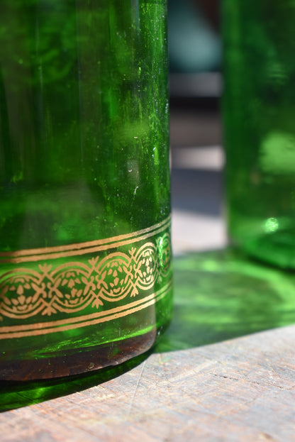 Three Green Pharmacy Bottles