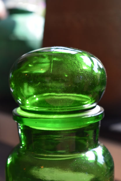 Three Green Pharmacy Bottles